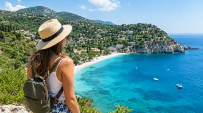 Traveller looking over a turquoise coastline